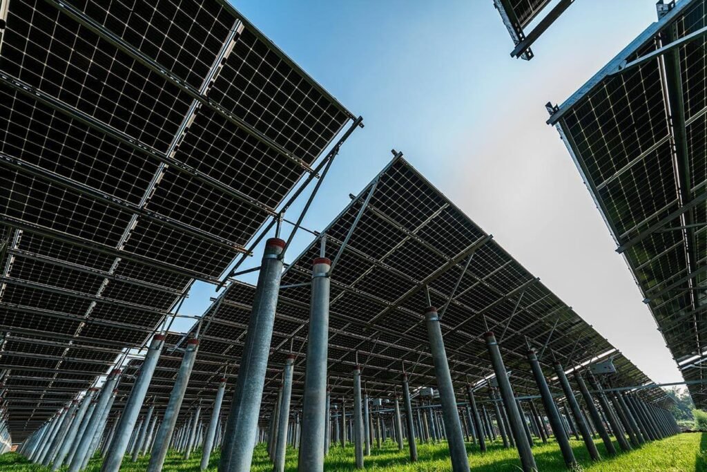 EV charging connector plugged into vehicle at charger